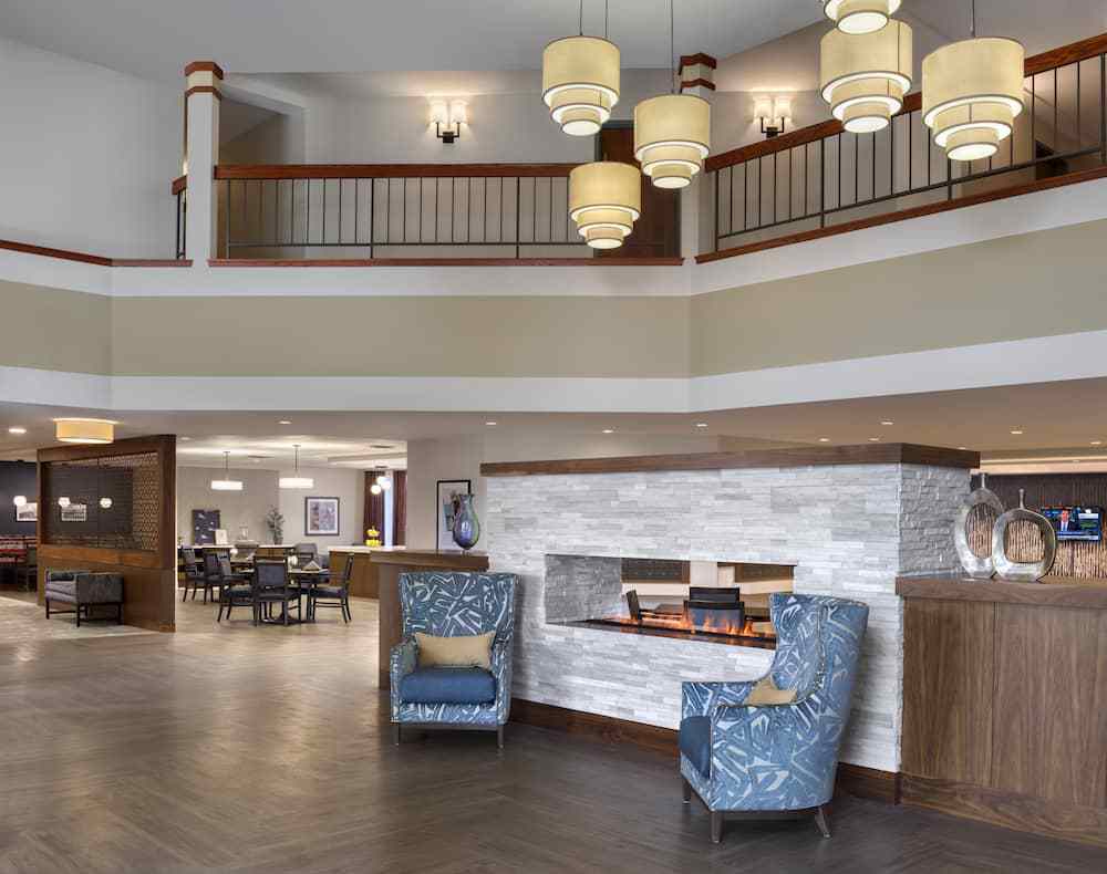 A modern lobby featuring stylish seating and elegant lighting.
