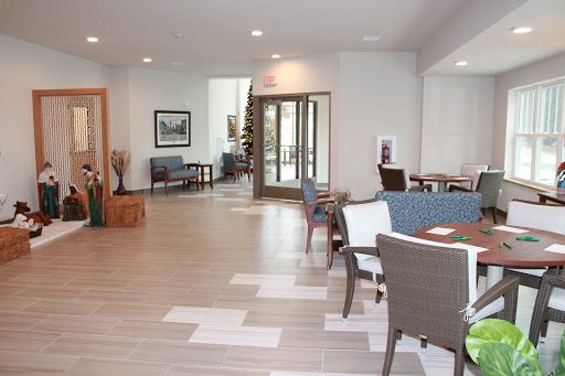A spacious and inviting lobby area featuring modern furniture and ample natural light.