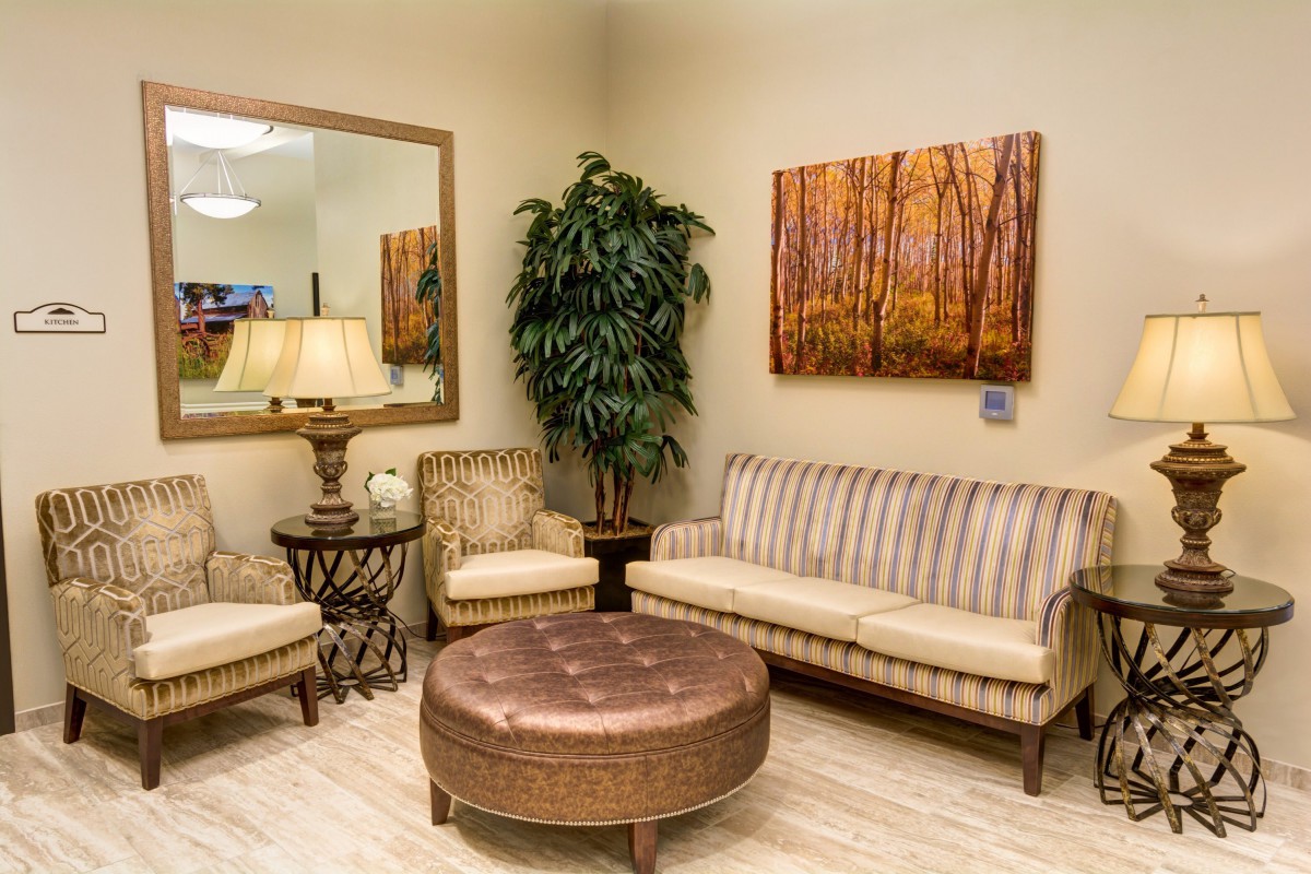A cozy living room with comfortable seating and warm decor.