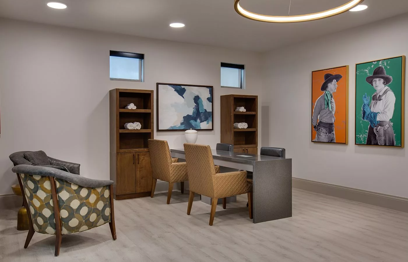 A modern office space featuring stylish furniture and contemporary artwork.