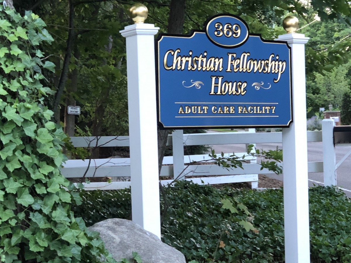 Sign for Christian Fellowship House, an adult care facility.