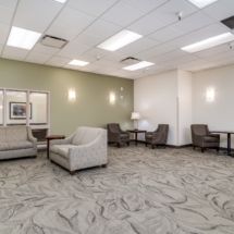 A spacious, well-lit waiting room with comfortable seating arrangements.