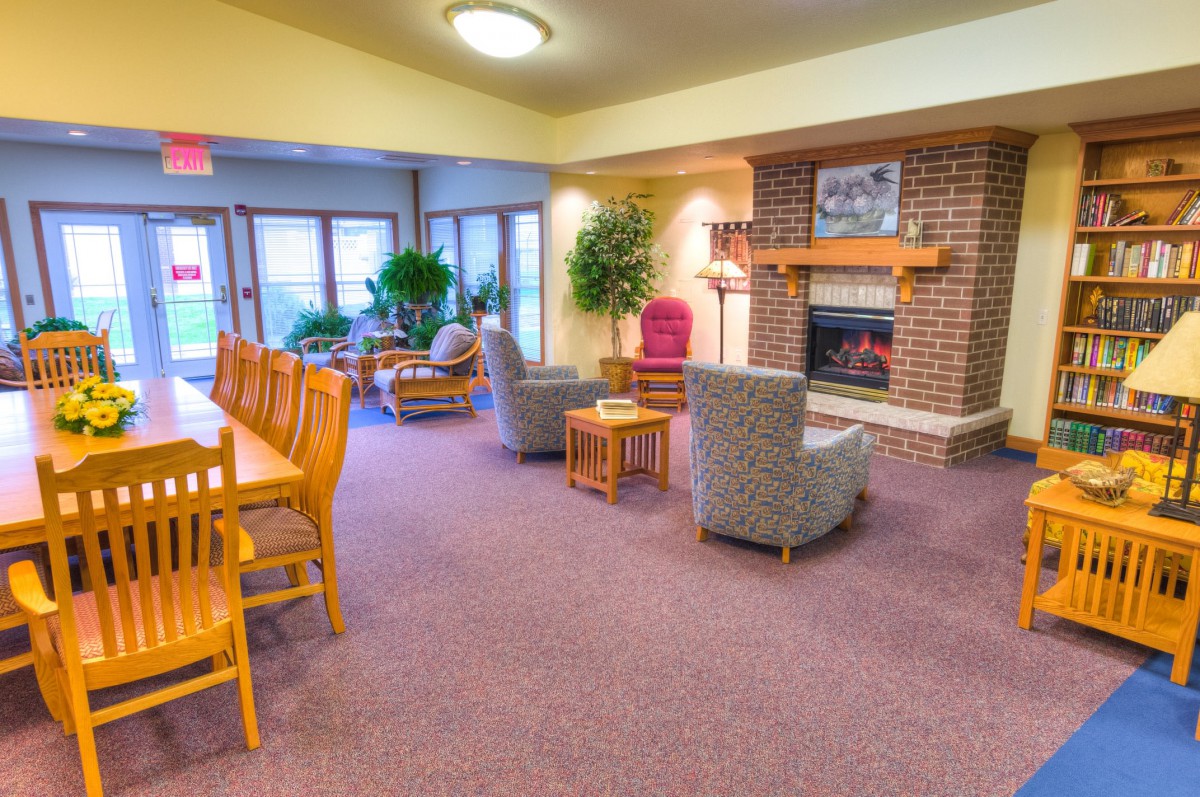 Cozy living room with a fireplace and comfortable seating area.
