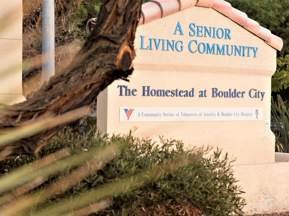 Entrance sign for a senior living community.
