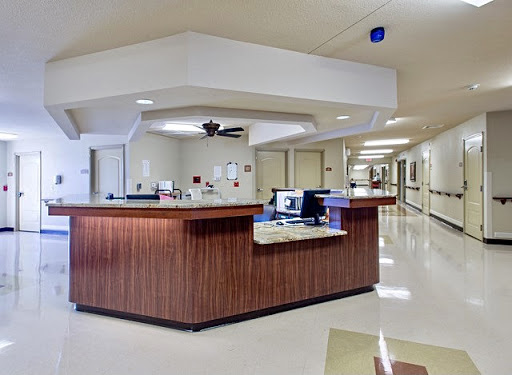 A view of the reception area in a hospital, showcasing a clean and organized environment.