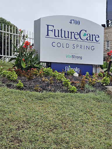 Entrance sign for FutureCare Cold Spring surrounded by vibrant landscaping.
