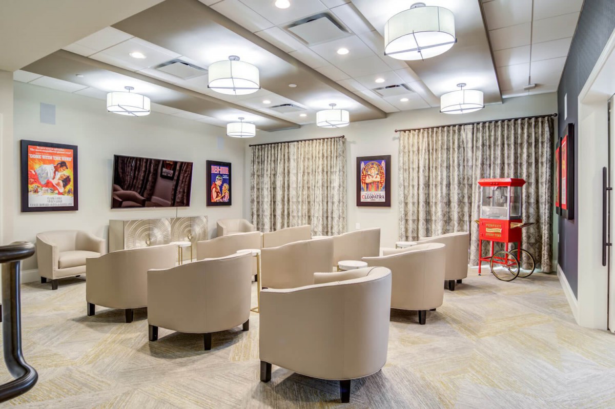 A modern lounge with comfortable seating and stylish lighting.