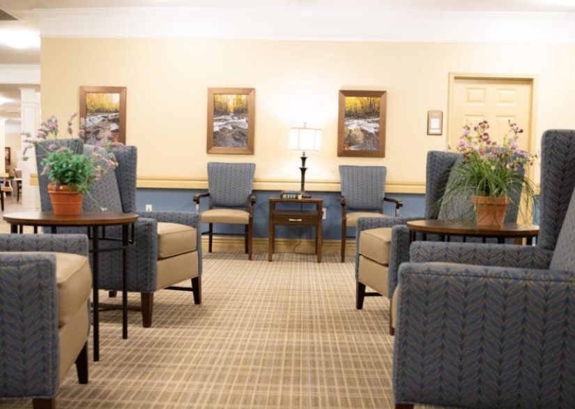 A cozy waiting room with comfortable seating and tasteful decor.