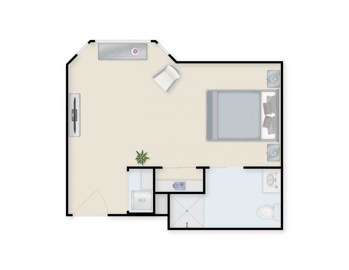 A small one-bedroom apartment floor plan with a living area, bedroom, kitchen, and bathroom.