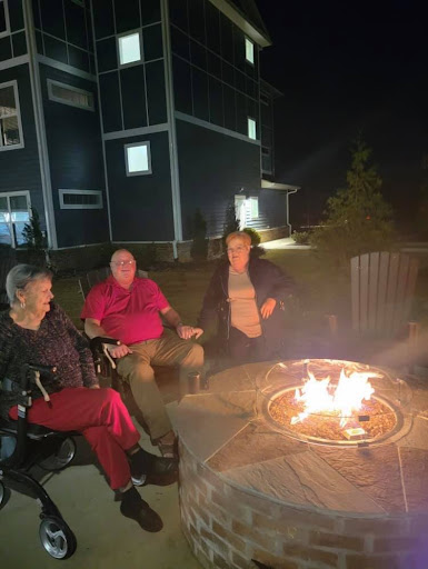 Enjoying a cozy night by the campfire with friends.