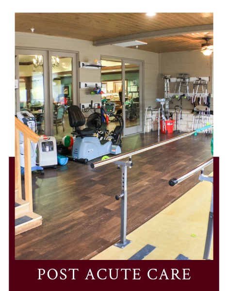 A rehabilitation center equipped with various therapy tools and parallel bars for physical therapy exercises.