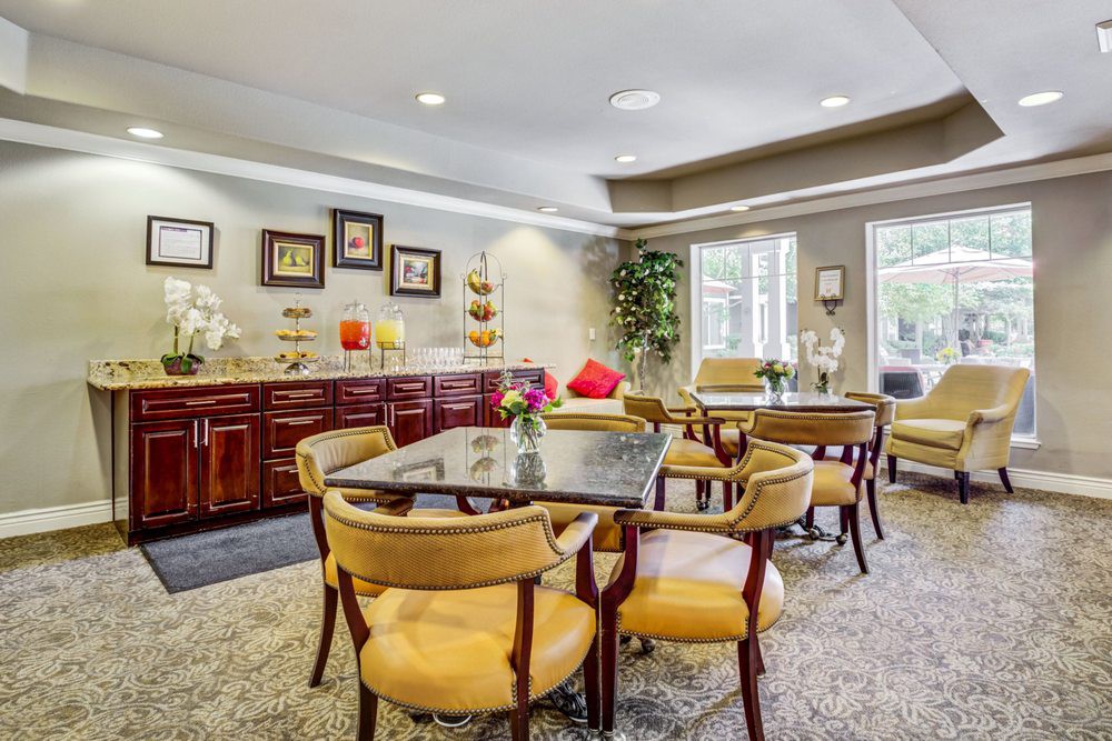 A cozy and well-decorated dining area with elegant furniture.