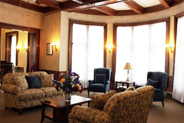 A cozy living room with elegant furniture and soft lighting.