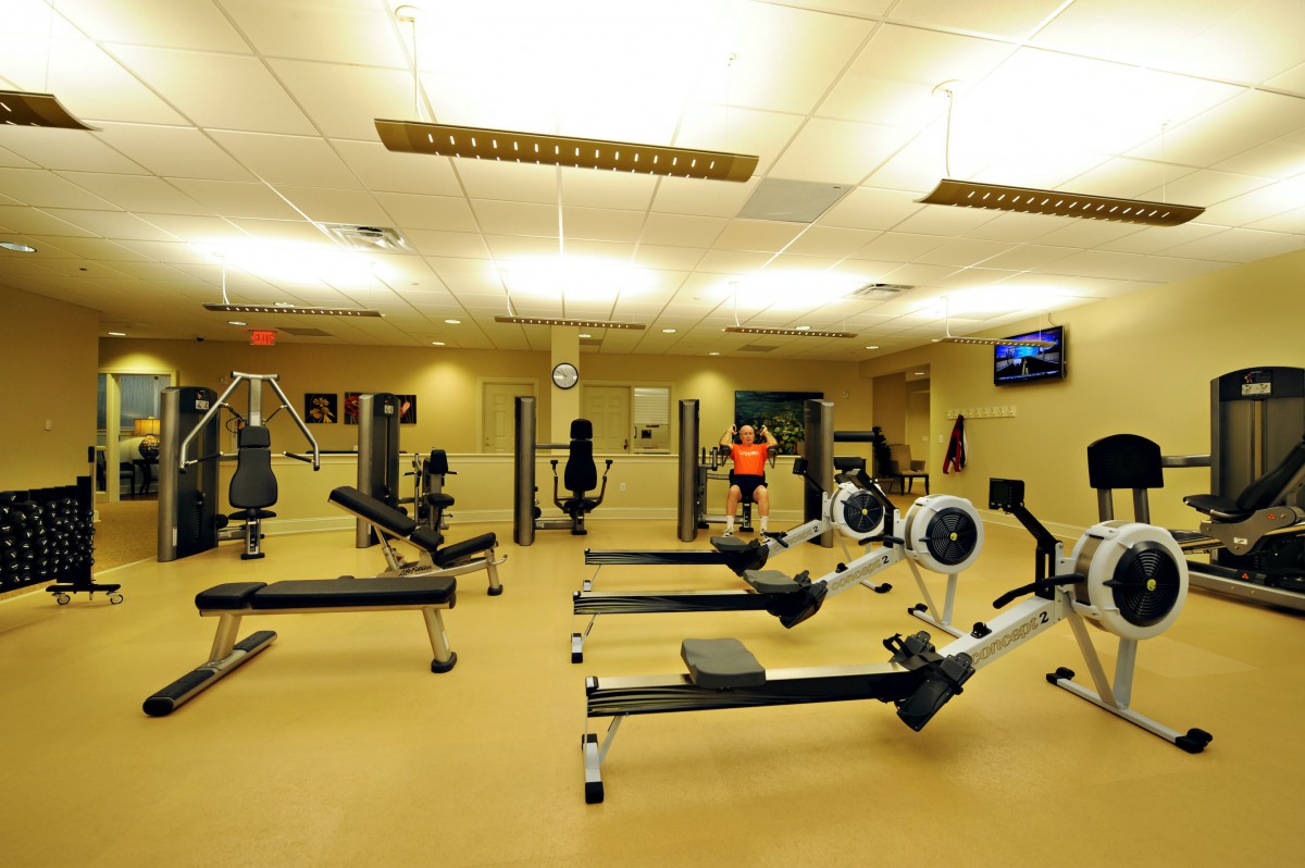 A well-equipped gym with various exercise machines and equipment.