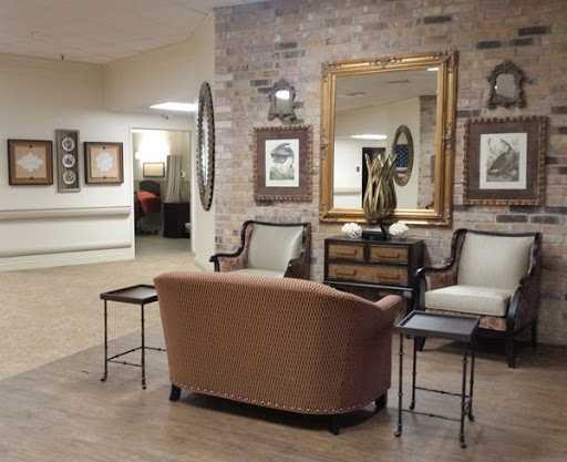 A cozy lounge area featuring vintage furniture and tasteful decor.