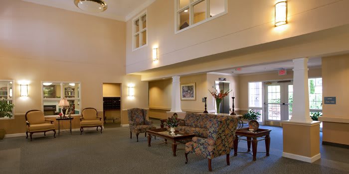 A spacious lobby area with comfortable seating and elegant decor.