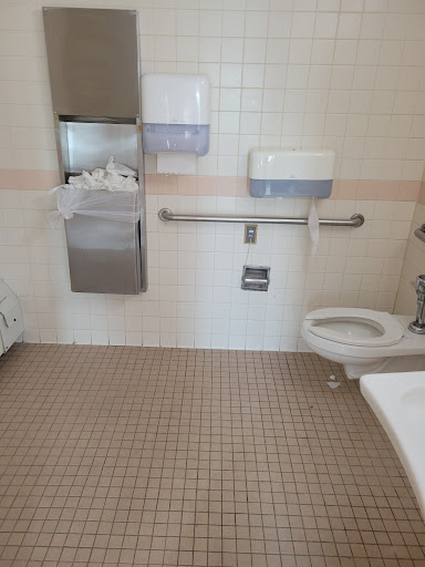 A clean and well-maintained restroom featuring essential fixtures.