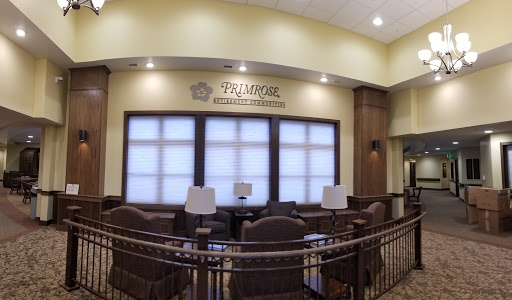A cozy lobby space featuring comfortable seating and natural light.