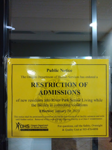 A public notice indicating a restriction of admissions due to health-related reasons.