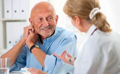 A patient having a consultation with a healthcare professional.