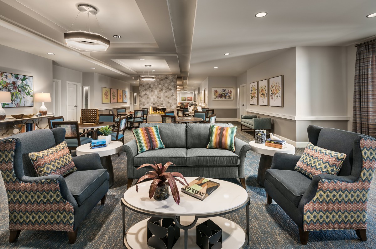 A modern living room with comfortable seating and stylish decor.