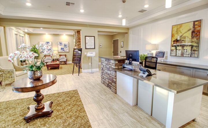 A modern reception area with a welcoming desk and comfortable seating.