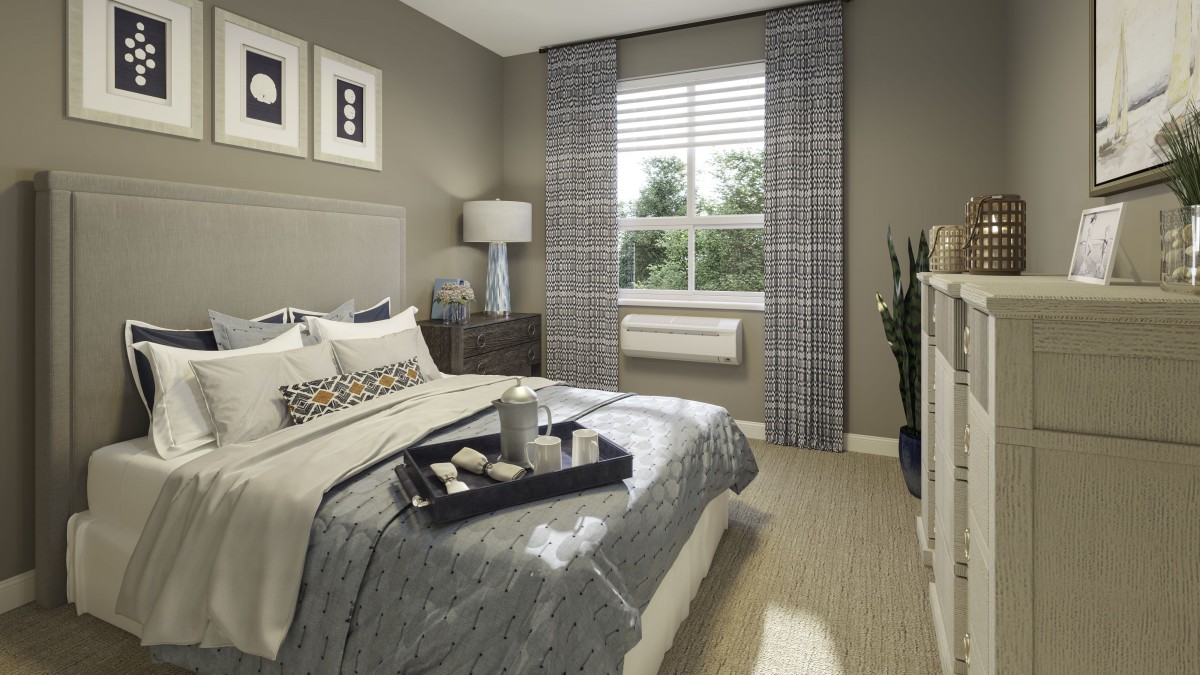 A modern bedroom with stylish decor and a cozy ambiance.
