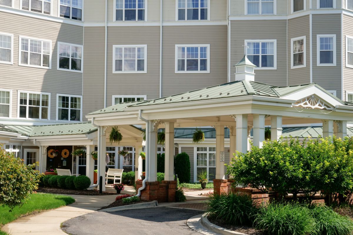 A well-maintained building entrance with landscaping.