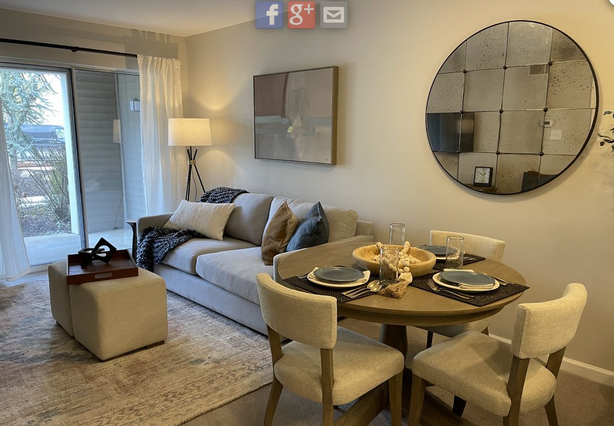 A cozy living and dining area featuring modern furniture and stylish decor.