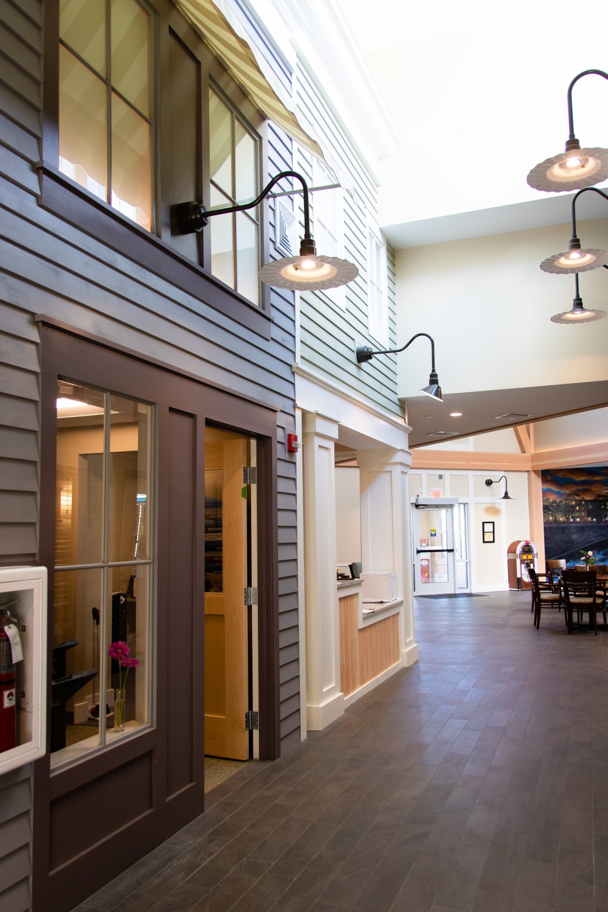 A modern interior hallway with stylish lighting and contemporary design elements.