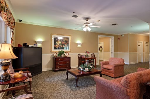 A cozy living room with comfortable seating and soft lighting.