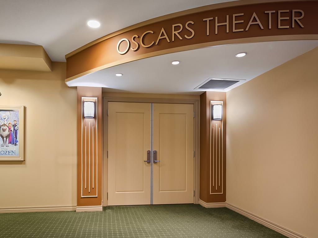 Entrance to Oscar's Theater with elegant lighting and decor.