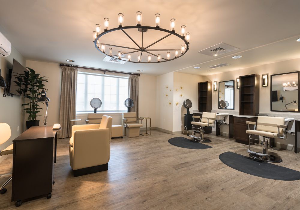 A modern and luxurious salon interior with stylish lighting.