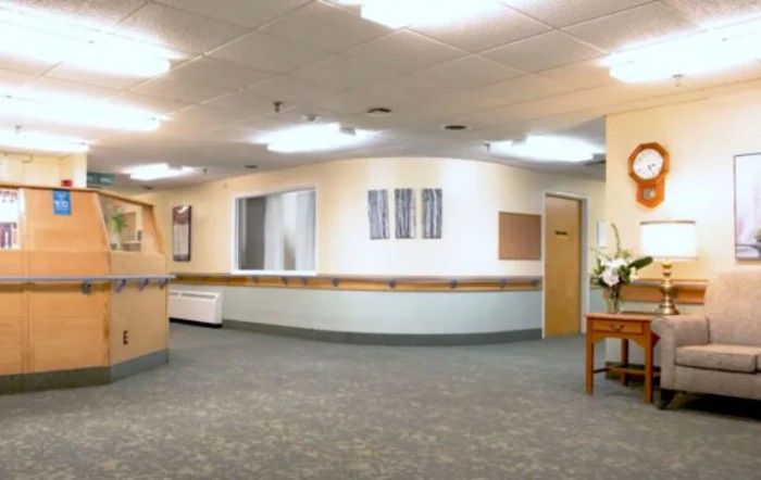 Hospital reception area with a clean and well-lit interior.