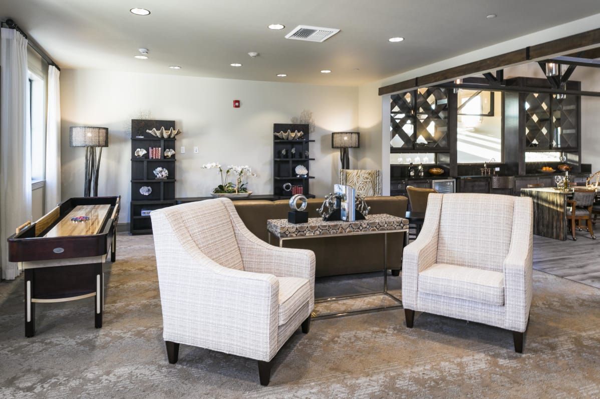 A modern living room interior with stylish furniture and decor.