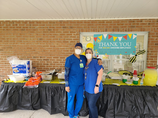Healthcare professionals gathering at a thank you event, showing appreciation for their hard work.