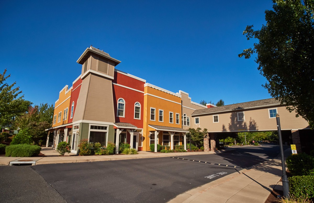 A colorful, contemporary building complex on a sunny day.