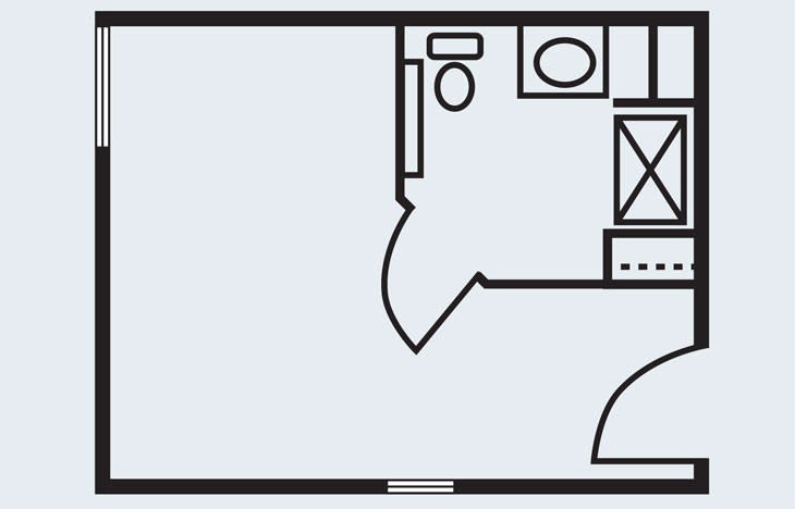 A simple floor plan depicting a room with a bathroom layout.