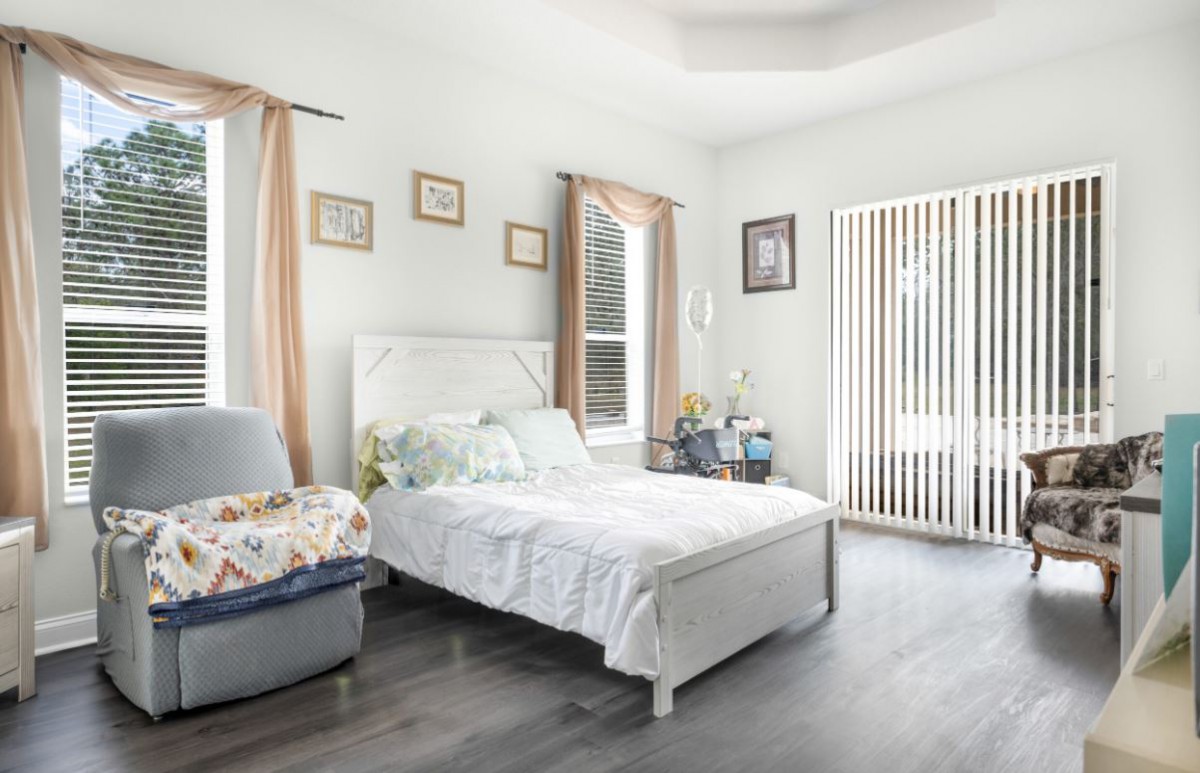 A bright and cozy bedroom with elegant decor.