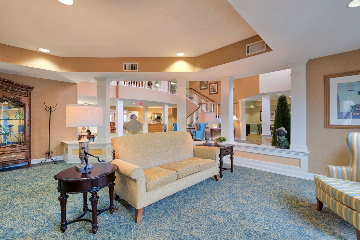 A modern lobby featuring comfortable seating and stylish decor.
