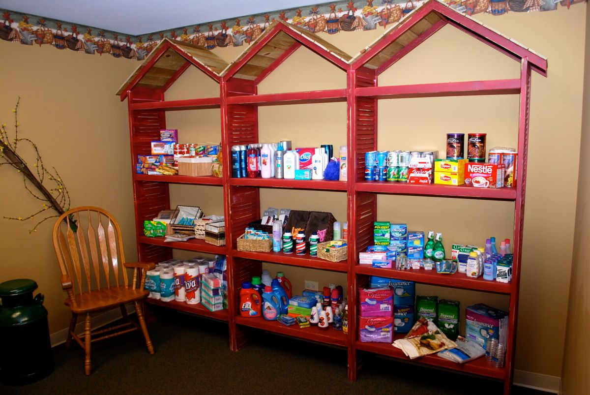 Organized shelves stocked with various household supplies.