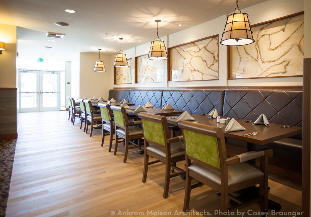 A modern restaurant dining area with stylish decor and ample seating.