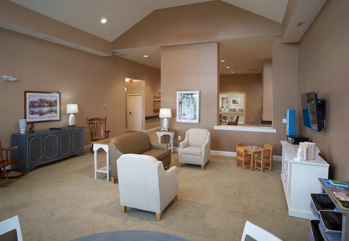Spacious living room with comfortable seating and modern decor.