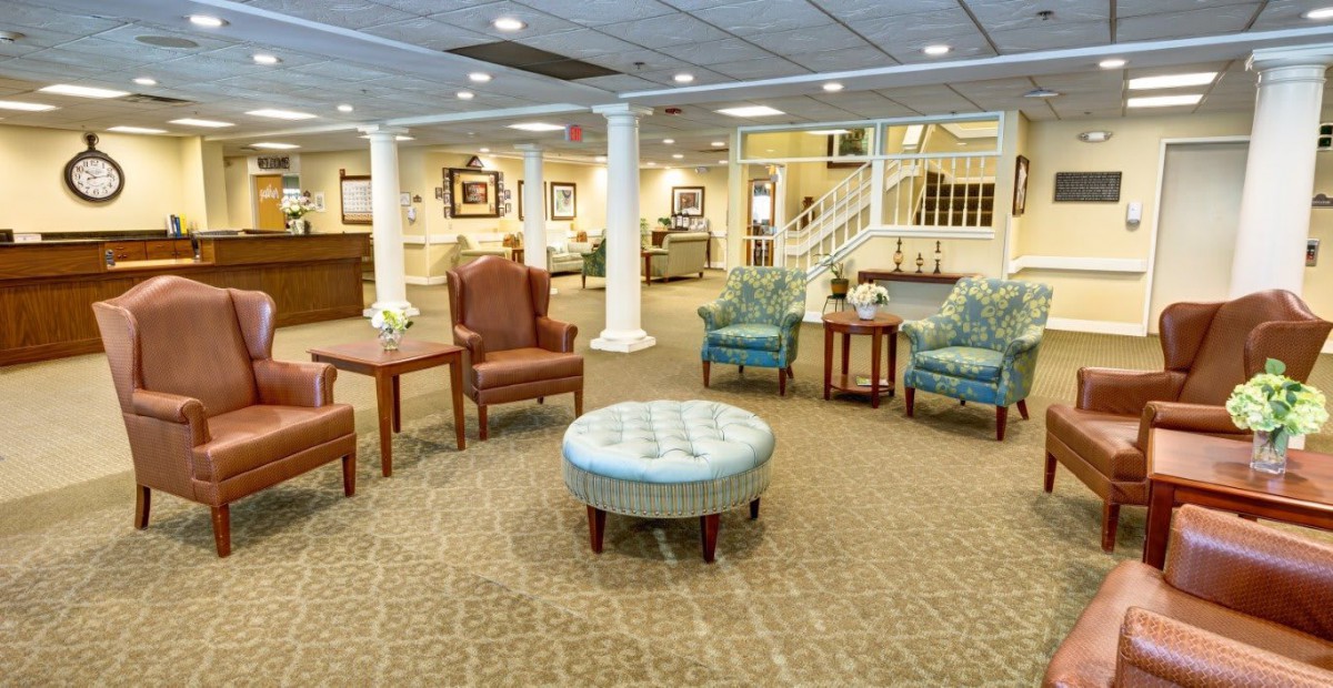 A spacious lobby with comfortable seating and elegant decor.