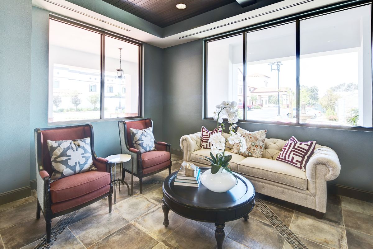 A cozy living room with elegant seating and decor.