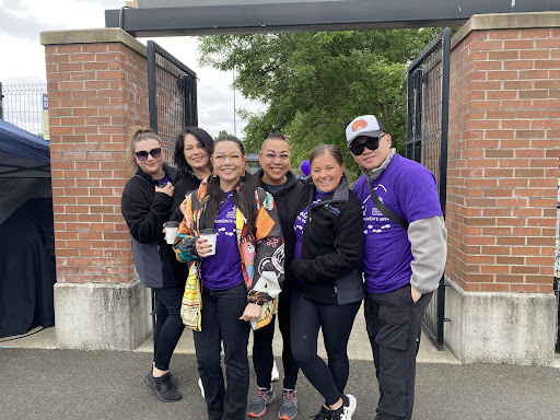 A fun day out with friends, celebrating together in our matching purple shirts!