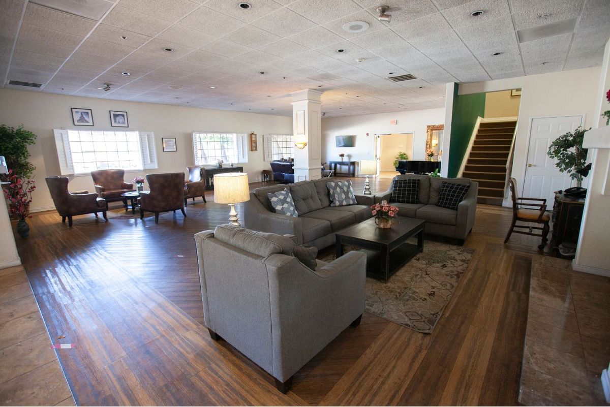 Spacious living room with comfortable seating and elegant decor.