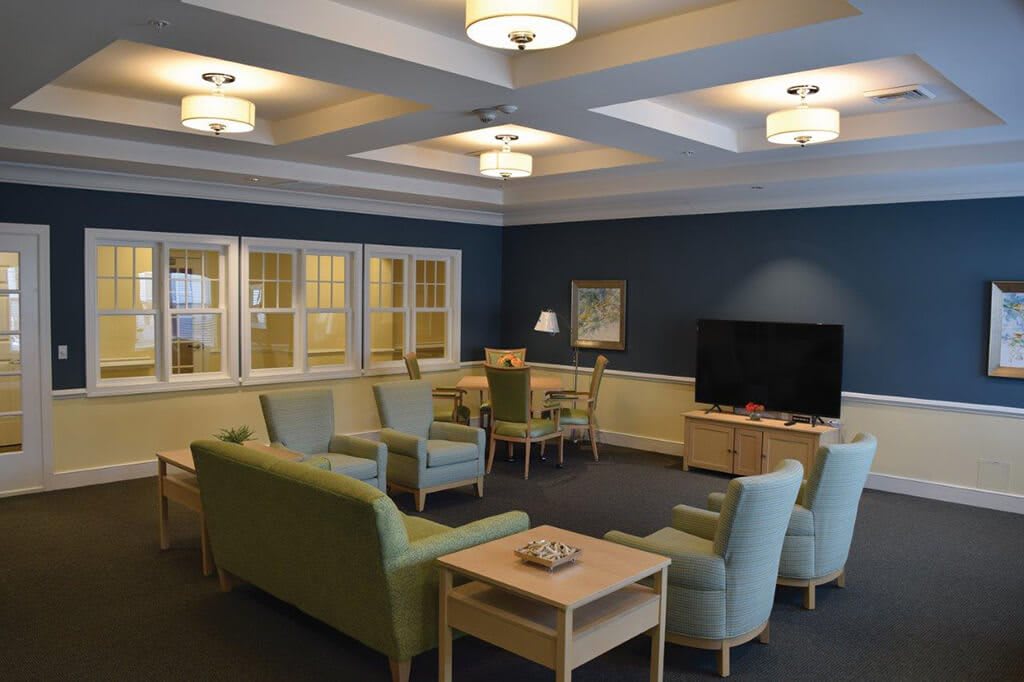 A cozy living room with comfortable seating and a television.