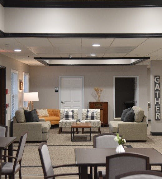 A modern and cozy living room with comfortable seating and stylish decor.