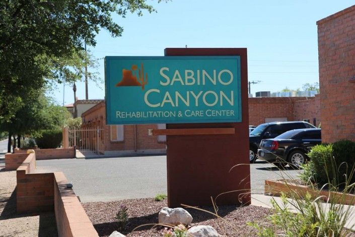 Entrance sign for Sabino Canyon Rehabilitation & Care Center.